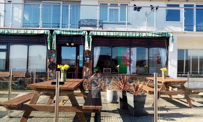Upstairs rooms have private balconies, and the downstairs have their own private patio spaces